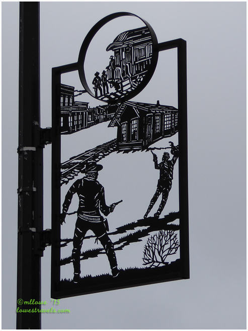 Pole banner art in Dodge City