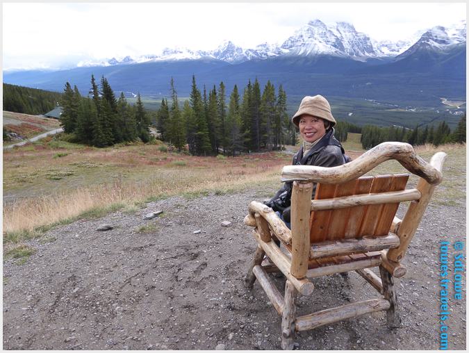 No red chair but a wooden one with a view