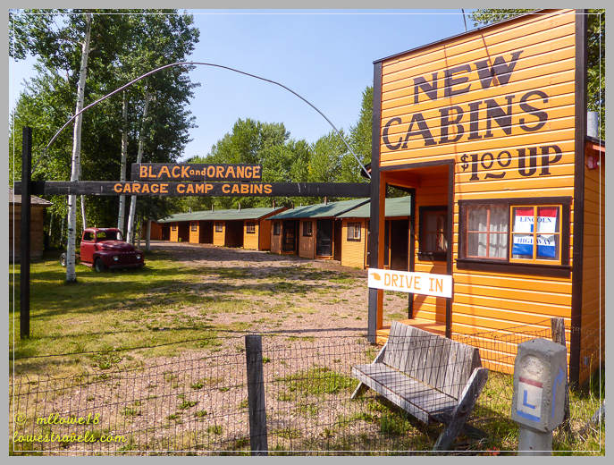 Black and Orange Garage Camp cabins