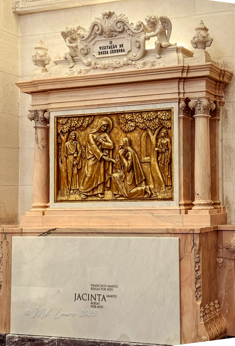 Relief sculpture depicting the Visitation of Our Lady, featuring figures including Mary and two children, set on an ornate altar with marble details.